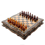Шахматы из карельской березы с фигурами из янтаря