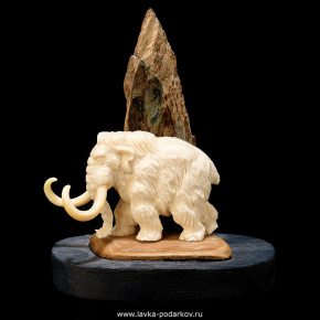 Скульптура из бивня мамонта "Мамонт у скалы", фотография 0. Интернет-магазин ЛАВКА ПОДАРКОВ