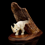  Изделия из кости Скульптура "Пещерный носорог" Бивень мамонта, клык моржа А855