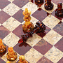 Шахматы с полем из камня и фигурами из янтаря 34х34 см, фотография 7. Интернет-магазин ЛАВКА ПОДАРКОВ