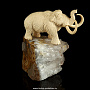 Скульптура из кости "Мамонт". Бивень мамонта, аметист, фотография 3. Интернет-магазин ЛАВКА ПОДАРКОВ