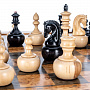 Шахматы из карельской березы с деревянными фигурами "Непобедимые" 45х45 см, фотография 6. Интернет-магазин ЛАВКА ПОДАРКОВ