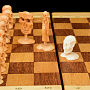 Шахматы деревянные "Жизнь после смерти" с фигурами из бивня мамонта 20,5х20,5 см, фотография 4. Интернет-магазин ЛАВКА ПОДАРКОВ