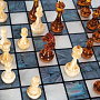 Шахматы с перламутром и фигурами из янтаря 45х45 см, фотография 7. Интернет-магазин ЛАВКА ПОДАРКОВ