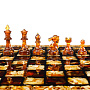 Шахматы складные с инкрустацией и фигурами из янтаря 34х34 см, фотография 3. Интернет-магазин ЛАВКА ПОДАРКОВ