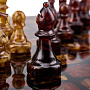 Шахматы с инкрустацией и фигурами из янтаря 28х28 см, фотография 8. Интернет-магазин ЛАВКА ПОДАРКОВ