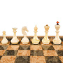 Шахматы из карельской березы с янтарными фигурами 47х47 см, фотография 6. Интернет-магазин ЛАВКА ПОДАРКОВ