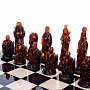 Шахматы с янтарными фигурами "Ледовое побоище" 48х48 см, фотография 1. Интернет-магазин ЛАВКА ПОДАРКОВ